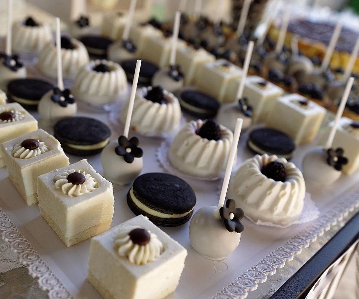 Artisan confectionery being hand-rolled and decorated